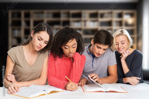 Happy students friends learning in library for education