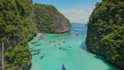 Aerial drone shot flying above Phi Phi islands landmark of Krabi, Thailand. 