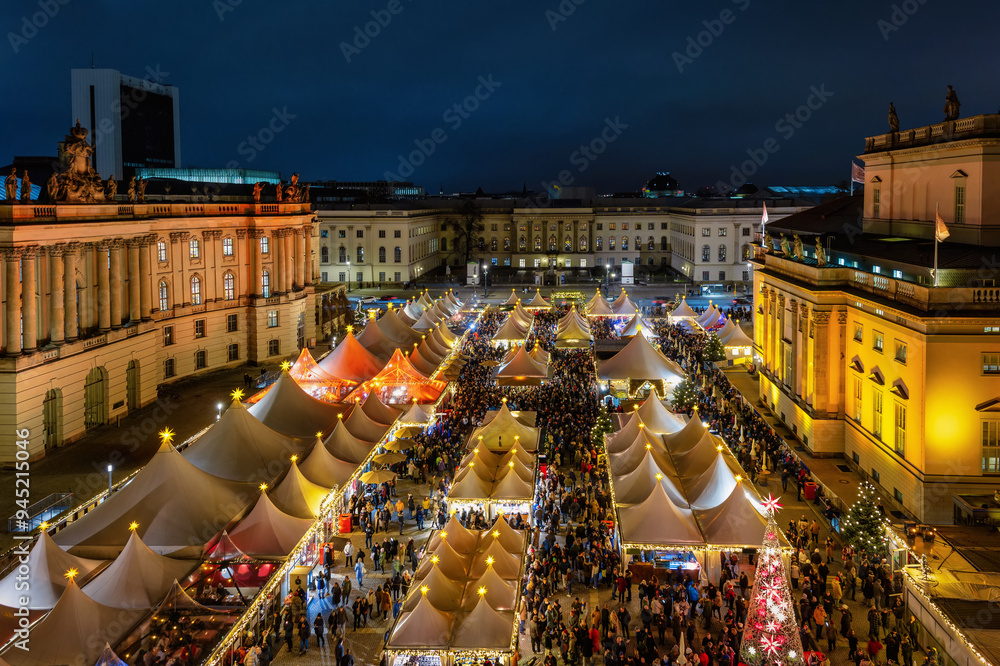 Elevated view of a festive illuminated Christmas market in central Berlin Mitte, Bebelplatz, Germany