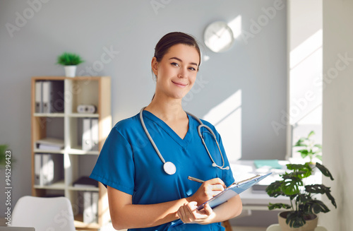 Принти на полотні Portrait of happy female nurse or doctor at work