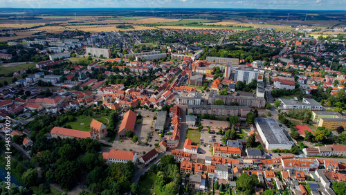 An aerial panorama view of the old town around the city Wolmirstedt in Germany on a summer day.