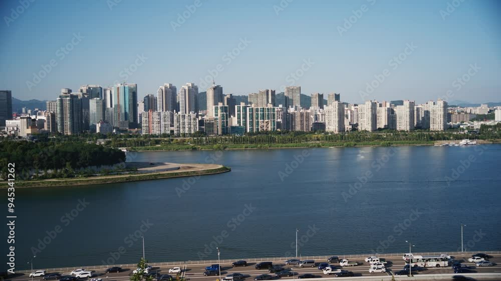 Panoramic View of Nodeul Island Park and Seoul Skyline Over the Han River with paning. Panoramic View of Nodeul Island Park and Seoul Skyline Over the Han River with paning.