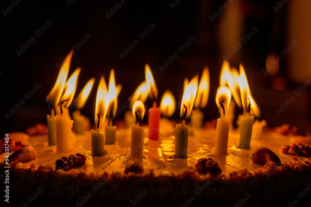 Fototapeta premium Candles on a birthday cake