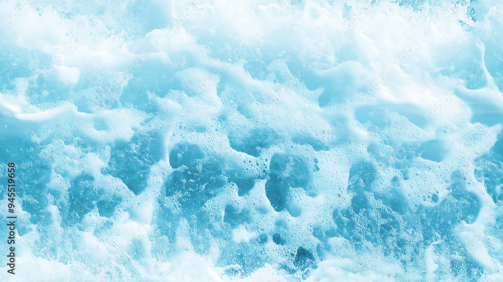 Fototapeta premium breaking wave texture with foamy crest and water droplets