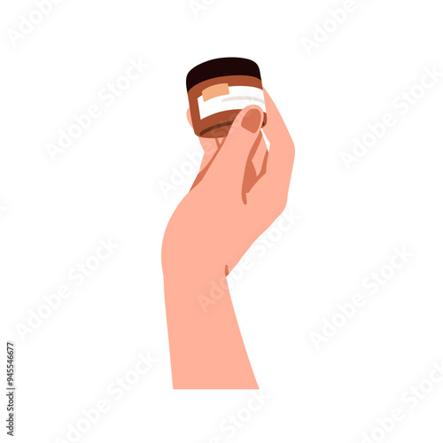 Cosmetic jar with moisturizing cream in hand. Holding face skin moisturizer, ...