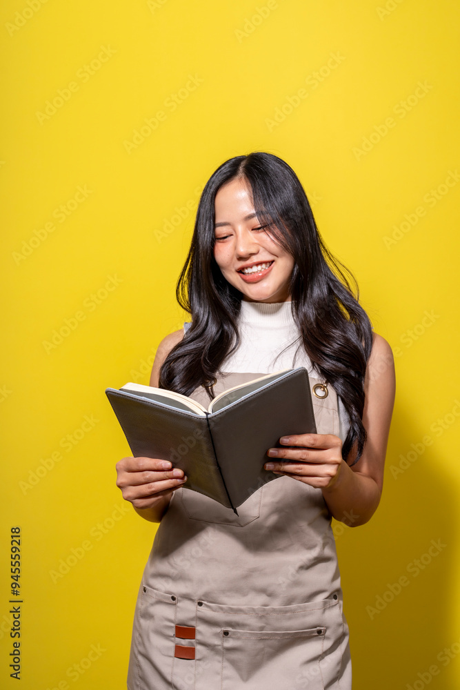A woman is reading a book while smiling A woman is reading a book while smiling