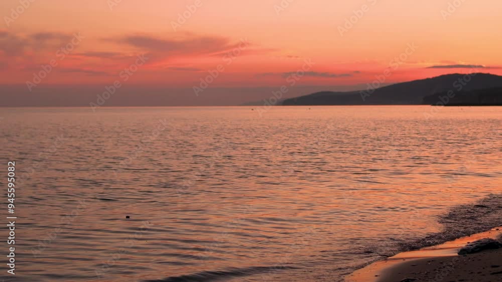 Sea Amazing Bright Orange Coral Yellow Sunset Sky Sun Colored Cirrus Clouds, Sandy Beach Mountains Waves Seashore, Ocean, Colorful Sunset Sky Planet, Relax, Travel, Beauty. Sea Amazing Bright Orange Coral Yellow Sunset Sky Sun Colored Cirrus Clouds, Sandy Beach Mountains Waves Seashore, Ocean, Colorful Sunset Sky Planet, Relax, Travel, Beauty.