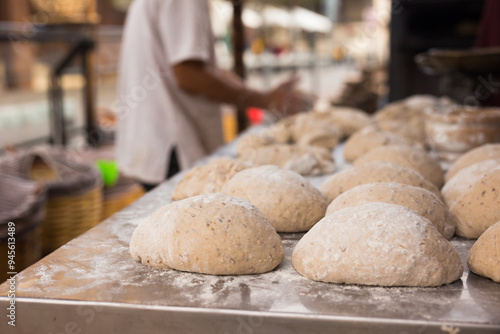 Bread preparation. loaves of dough before baking photo