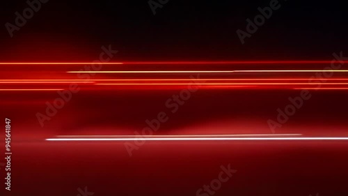 speed motion red streaks of light lines on dark background dynamic video