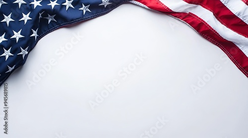 American flag draped in the top corners of a white background.