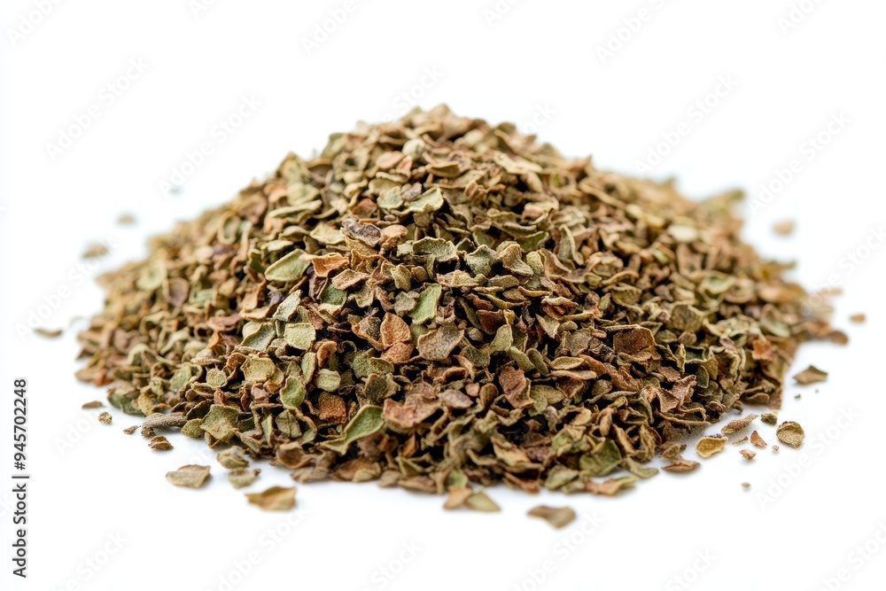 A pile of dried herbs, likely used for seasoning or cooking. A pile of dried herbs, likely used for seasoning or cooking.