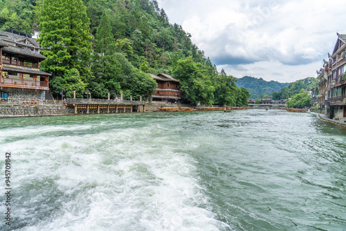 Traditional Miao Architecture and Mountainous Scenery in Fenghuang Ancient Town, Hunan Xiangxi photo