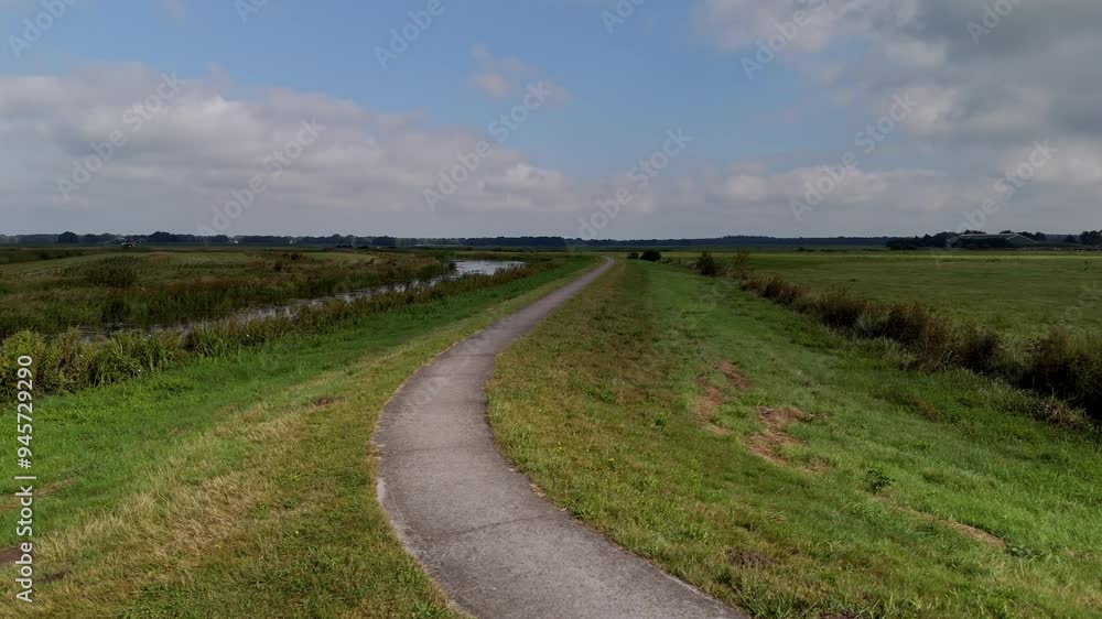 Aerial View of Cycling Path through Friesland Polder Along the Tjonger River Aerial View of Cycling Path through Friesland Polder Along the Tjonger River