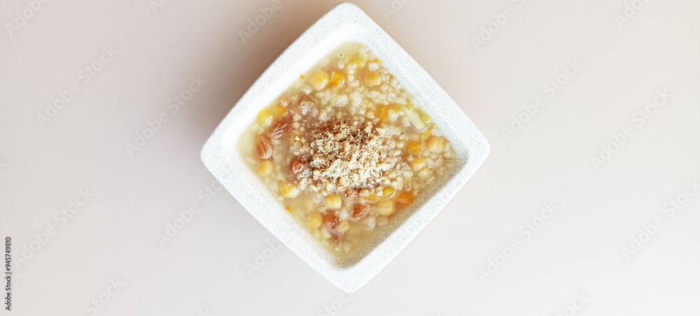 Ashura or Ashura dessert made with legumes and dried fruits on a white background Ashura or Ashura dessert made with legumes and dried fruits on a white background