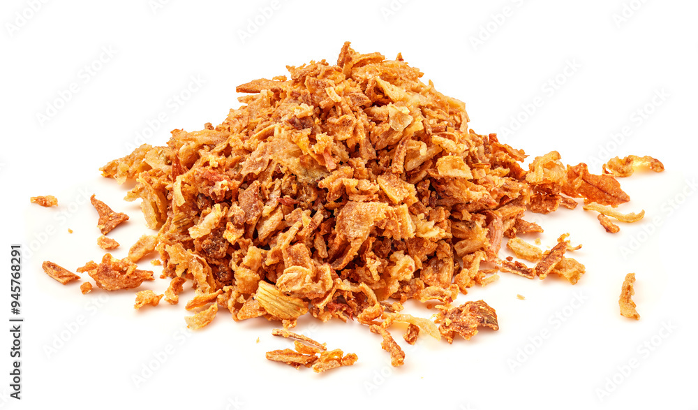 Pile of crispy fried onions isolated on white. Roasted Onions or Scattered Dry Onion Pieces close up. Pile of crispy fried onions isolated on white. Roasted Onions or Scattered Dry Onion Pieces close up.