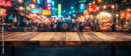 A rustic wooden table in the foreground, with a vibrant night market scene blurred in the background, creating a warm atmosphere.