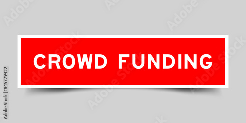 Red color square shape sticker label with word crowd funding on gray background