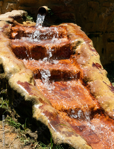 Spring of healing water, which colors the cascades red. Kokino nero - Greece. 
Adobe RGB color profile.