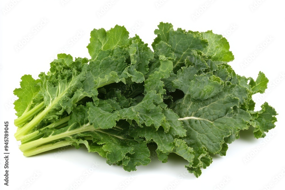 Fresh green kale leaves arranged neatly, showcasing their texture and color. Fresh green kale leaves arranged neatly, showcasing their texture and color.