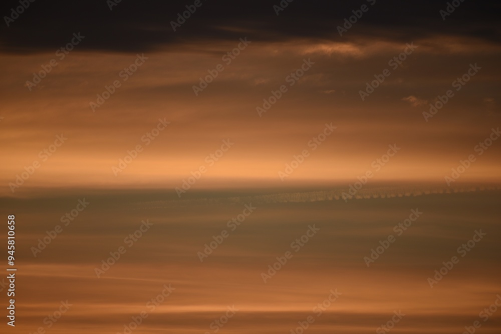 Reddish sky with lineal clouds at dusk Reddish sky with lineal clouds at dusk