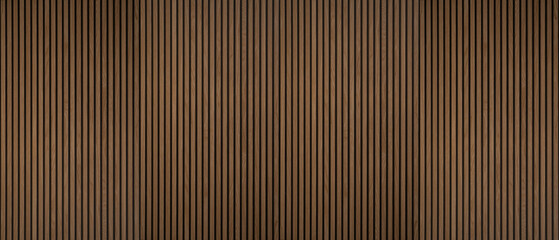 Wood background banner panorama long - Brown wooden acoustic panels wall texture , seamless pattern, vertical