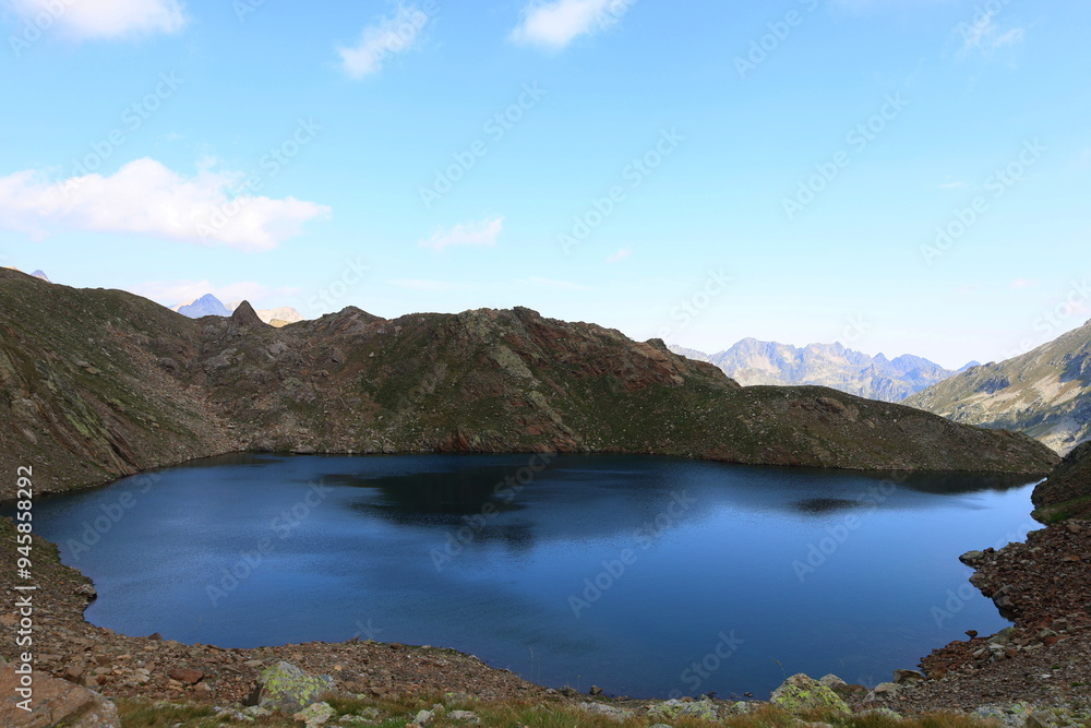 Lac du Col d'Arratille in the French Pyrenees, mountain lake near Cauterets, on the French-Spanish border Lac du Col d'Arratille in the French Pyrenees, mountain lake near Cauterets, on the French-Spanish border