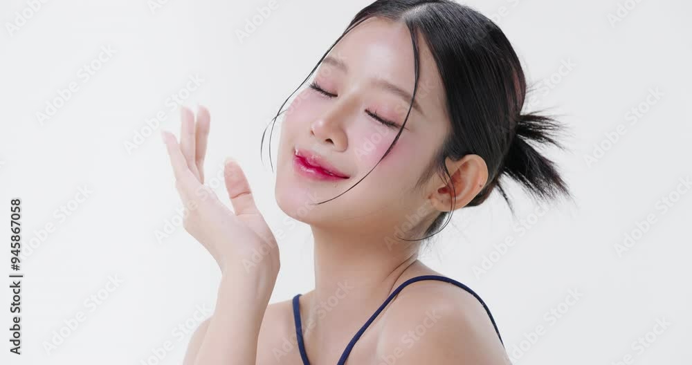 Close up portrait beautiful young Asian woman with healthy facial skin isolated over white background. Close up portrait beautiful young Asian woman with healthy facial skin isolated over white background.