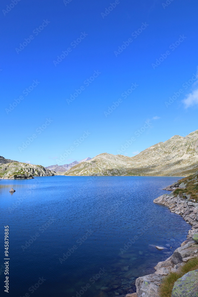 Fototapeta premium Mountain lake in Aiguestortes and Sant Maurici National Park, GR11 long-distance hiking trail, Pyrenees