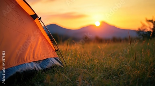 beautiful tent camping on gold grass on sunrays or sunset 