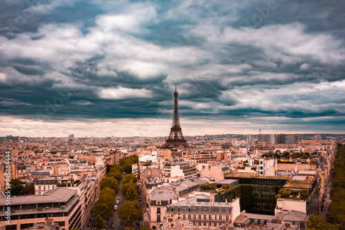 Panoramic aerial view of Paris city, France. Eiffel tower and parisian houses photo