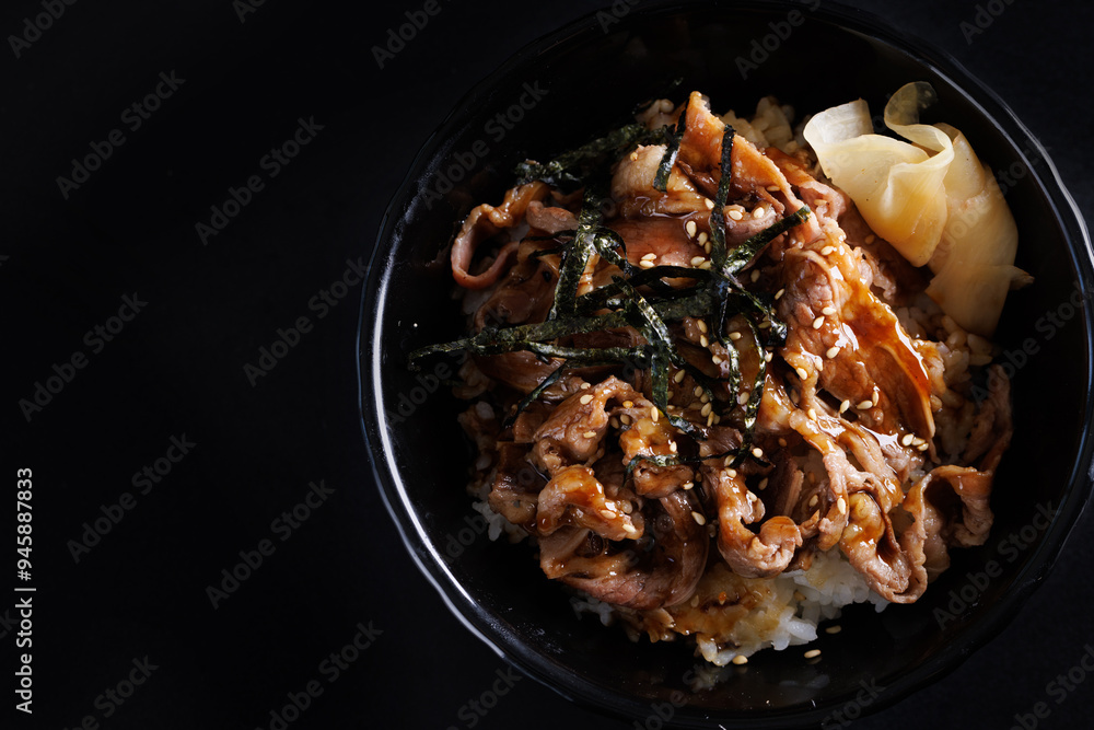 Stir Fried Pork with Teriyaki Sauce japanese food isolate in black background Stir Fried Pork with Teriyaki Sauce japanese food isolate in black background