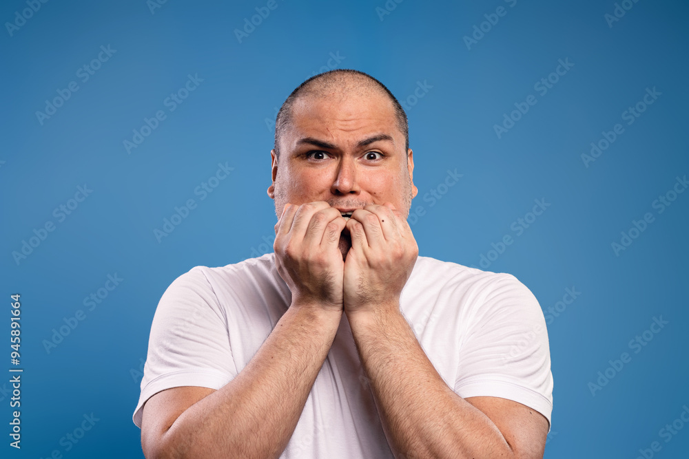 man with hands over mouth man with hands over mouth