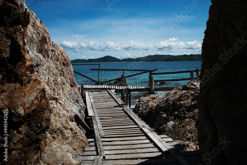 A wooden stairway to the sea. photo