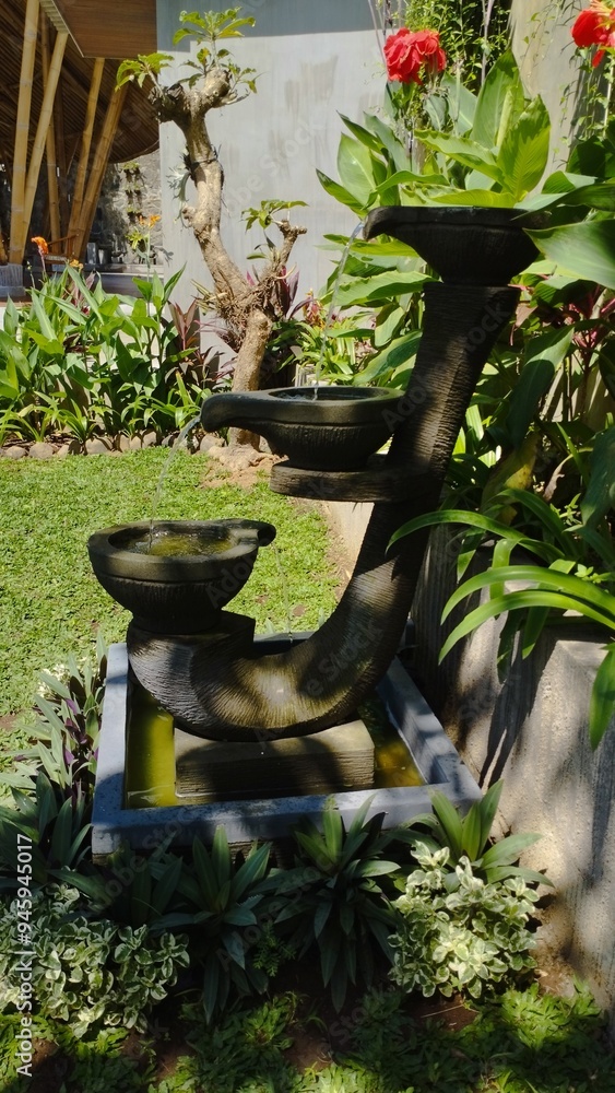 Bali Indonesia: balinese garden with stone Bali Indonesia: balinese garden with stone