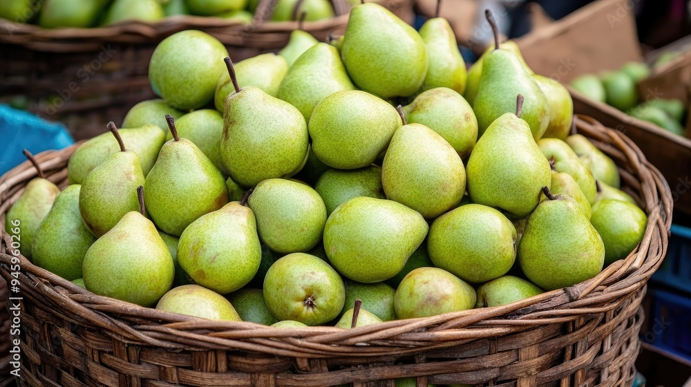 Depok, Indonesia - August 1st, 2024: A vibrant pile of green pears in a basket, fresh from the harvest and ready to be enjoyed. Depok, Indonesia - August 1st, 2024: A vibrant pile of green pears in a basket, fresh from the harvest and ready to be enjoyed.