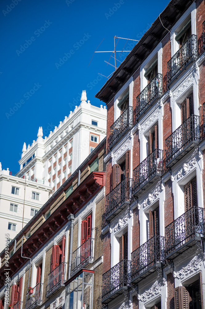 facade of a typical spanish building in Madrid facade of a typical spanish building in Madrid