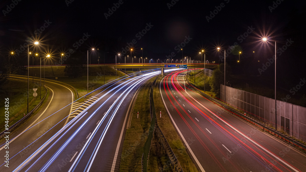 Long Exposure of a Highway Off-Ramp at Night in Brzesko with Car Lights Trail | Długi czar naświetlania - zjazd z autostrady nocą w Brzesku ze smugami światła samochodów Long Exposure of a Highway Off-Ramp at Night in Brzesko with Car Lights Trail | Długi czar naświetlania - zjazd z autostrady nocą w Brzesku ze smugami światła samochodów