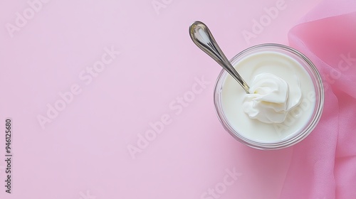 Creamy Dessert in Glass on Pink Background