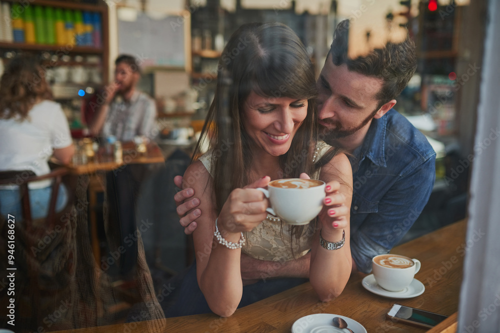 Coffee shop, happy and couple hug in window with drink, caffeine beverage and cappuccino in cafe. Dating, love and man and woman relax in restaurant for bonding, relationship and romance on weekend Coffee shop, happy and couple hug in window with drink, caffeine beverage and cappuccino in cafe. Dating, love and man and woman relax in restaurant for bonding, relationship and romance on weekend