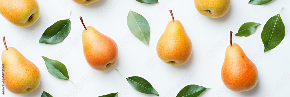 Obraz premium A visually appealing arrangement of pears and leaves on a white background.