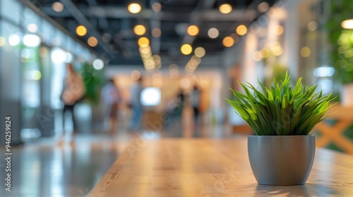 Modern Office Decor: A Touch of Green with a Small Potted Plant.