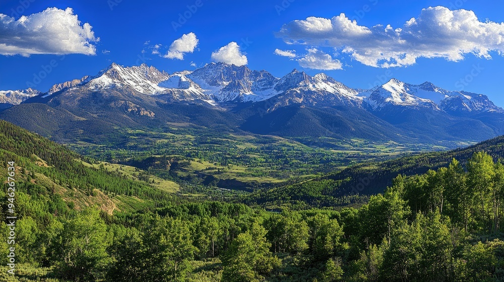 Enchanting view of the San Juan Mountains snowcapped peaks clear area for text Enchanting view of the San Juan Mountains snowcapped peaks clear area for text