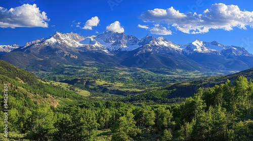 Enchanting view of the San Juan Mountains snowcapped peaks clear area for text