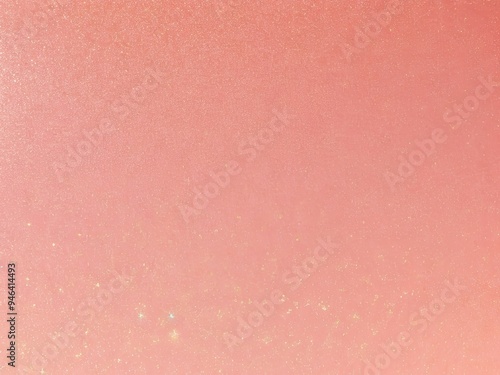 Abstract background with shimmering golden glitter and a gentle peach gradation. Combine copy space with a textured backdrop. Coral, orange, and pink hues photo