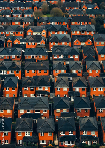 A large number of houses in a residential area photo