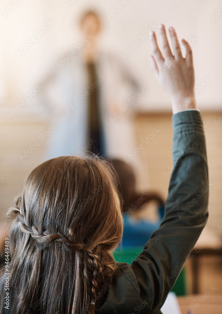 Girl, back and hand with question for teacher, answer or interaction in classroom at elementary school. Closeup, child or student with enquiry for invigilator or educator in exam, test or assessment Girl, back and hand with question for teacher, answer or interaction in classroom at elementary school. Closeup, child or student with enquiry for invigilator or educator in exam, test or assessment