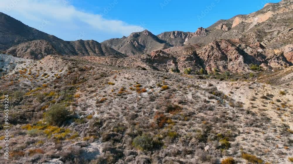 Aerial Flight in american desert. Hot sunny day. Drone cinematic shot of desert mountain landscape, dry semi-arid american region. Sand mountains and shrubs. desert. Aerial Flight in american desert. Hot sunny day. Drone cinematic shot of desert mountain landscape, dry semi-arid american region. Sand mountains and shrubs. desert.