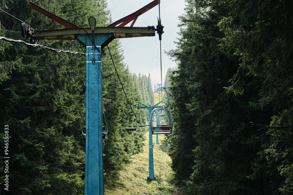 Paltinis ski resort during the summer time in Sibiu county, Carpathian Mountains. Romania. Chairlift. Păltiniș Paltinis ski resort during the summer time in Sibiu county, Carpathian Mountains. Romania. Chairlift. Păltiniș