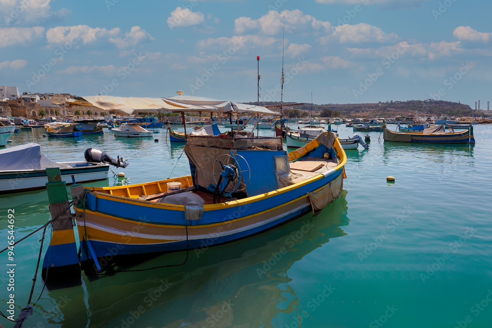 Malta The fishing village of Marsaxlokk, which is visited by many tourists. There is also a large seafood market here Malta The fishing village of Marsaxlokk, which is visited by many tourists. There is also a large seafood market here