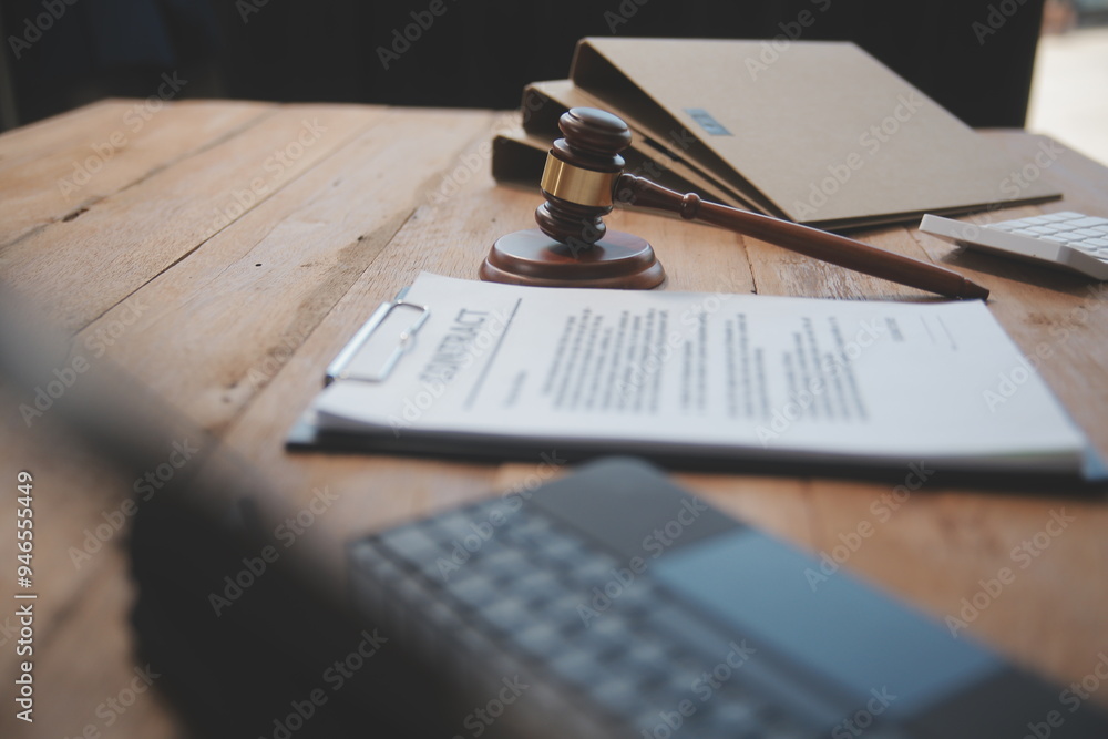 Judge gavel with Justice lawyers having team meeting at law firm background. Concepts of Law and Legal services. Judge gavel with Justice lawyers having team meeting at law firm background. Concepts of Law and Legal services.